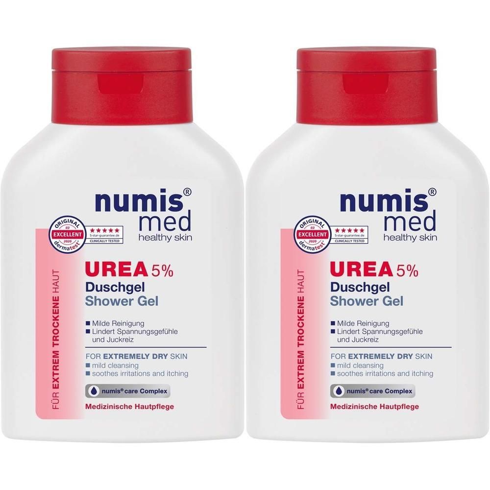 Zwei weiße Flaschen mit rotem Deckel. Aufschrift: numis med UREA 5% Duschgel. Für extrem trockene Haut. Mit Qualitätszeichen.