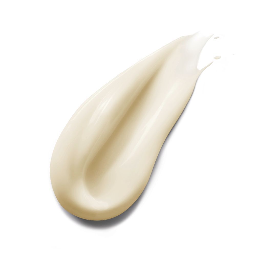 Klecks Creme. Cremefarben, auf weißem Hintergrund. Form: länglich, tropfenförmig.