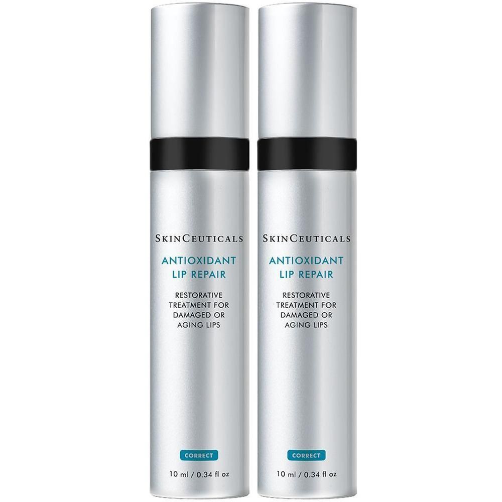 Zwei Flaschen Skinceuticals AOX Lip Repair. Silberne Flaschen mit schwarzem Band und blauer Schrift. Text: Antioxidant Lip Repair.