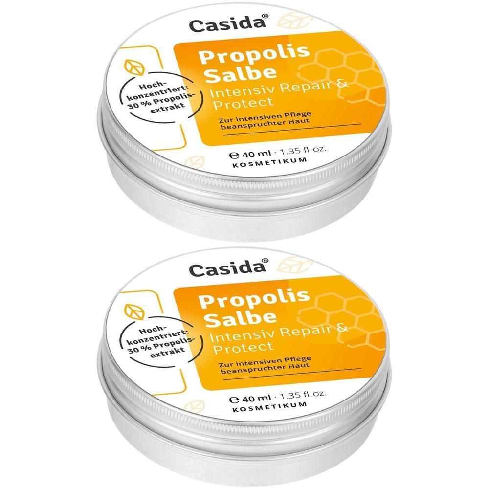 Zwei runde Metallbehälter mit Etikett. Aufschrift: Casida Propolis Salbe, Intensiv Repair & Protect.
