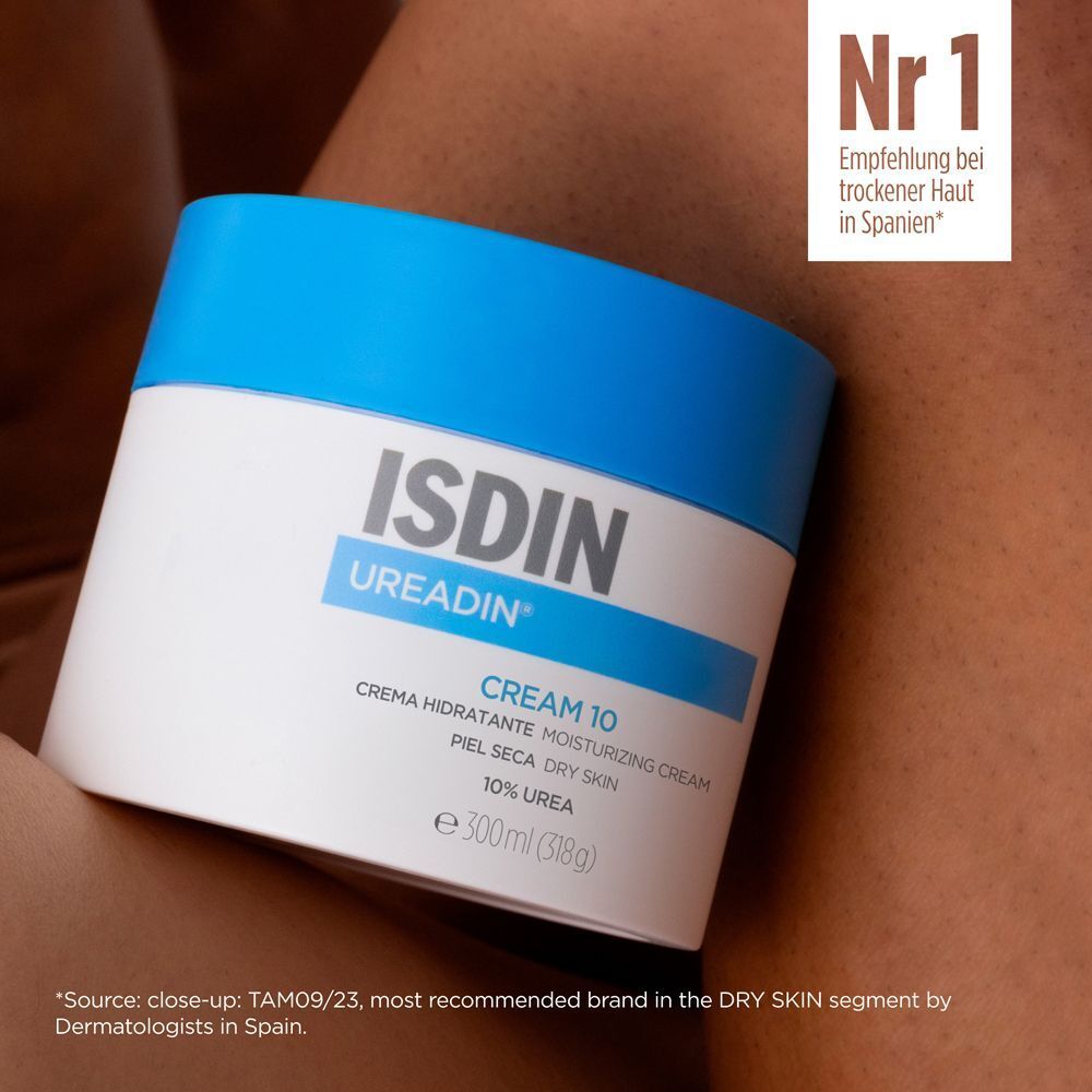 Cremetiegel mit blauem Deckel. Aufschrift: ISDIN Ureadin Cream 10. Text: Nr. 1 Empfehlung bei trockener Haut in Spanien.