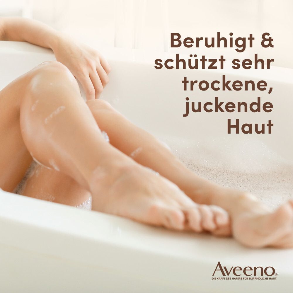 Beine in Badewanne mit Schaum. Text: Beruhigt & schützt sehr trockene, juckende Haut. Aveeno® Logo.