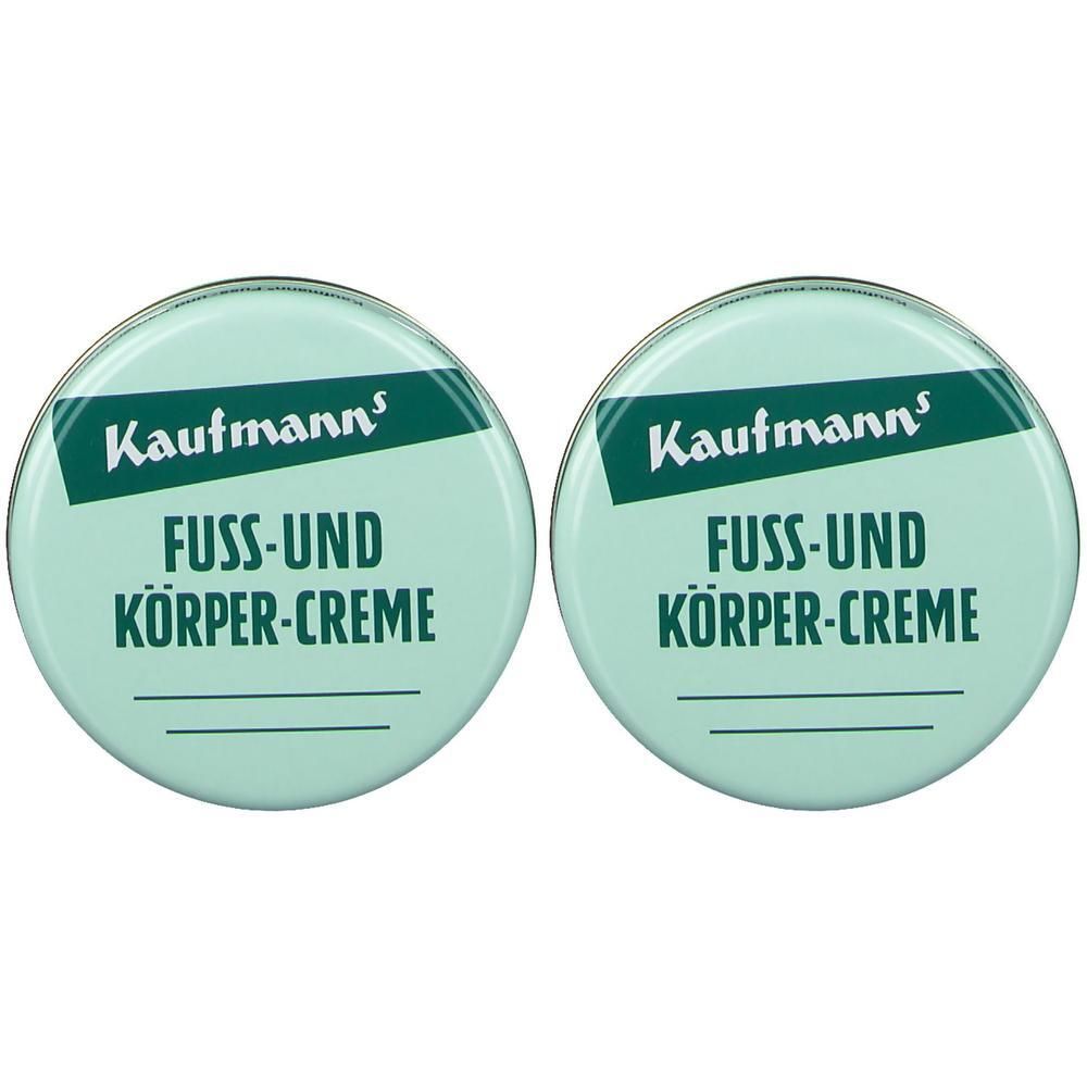 Zwei runde Dosen mit hellgrünem Deckel. Aufschrift: Kaufmanns FUSS-UND KÖRPER-CREME. Weißer Schriftzug auf grünem Hintergrund.