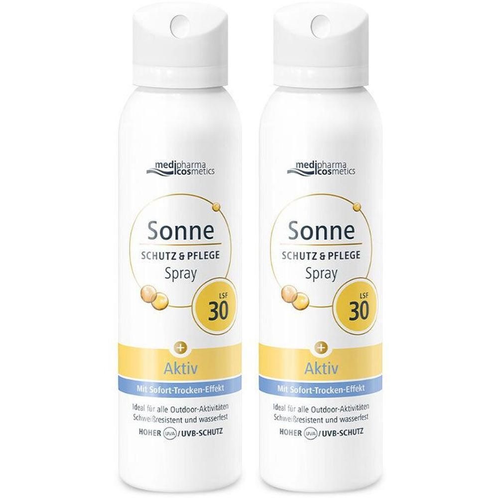 Zwei weiße Aerosolsprays mit weißem Deckel. Aufschrift: Sonne Schutz & Pflege Spray LSF 30. Marke: medipharma cosmetics.