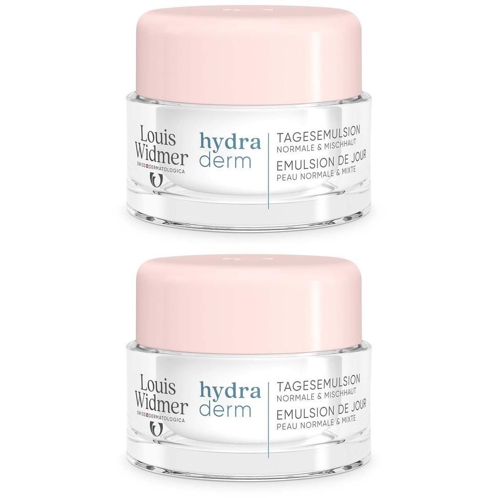 Zwei Tiegel Louis Widmer hydra derm Tagesemulsion. Runde, transparente Gläser mit rosa Deckel. Beschriftung: hydra derm, Tagesemulsion.