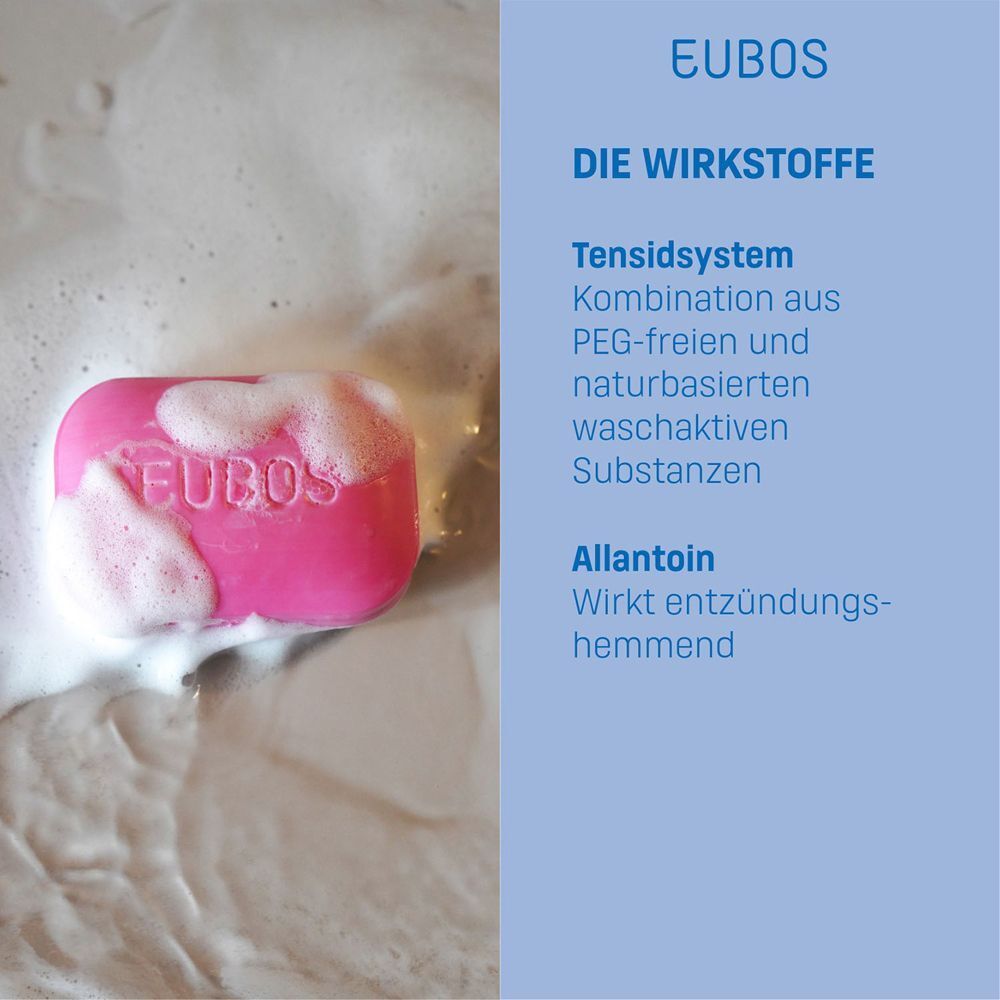 Rosa Seifenstück in Seifenschaum. Aufdruck "EUBOS". Text: "DIE WIRKSTOFFE". Text über Tensidsystem und Allantoin.