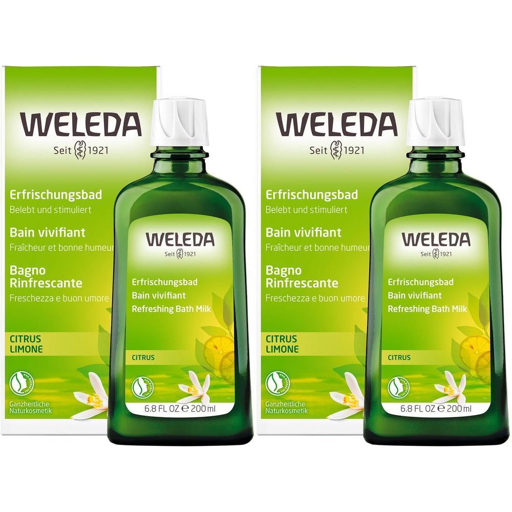 Zwei Flaschen mit grüner Flüssigkeit und weißem Verschluss. Aufschrift: Weleda, Erfrischungsbad, Citrus Limone.