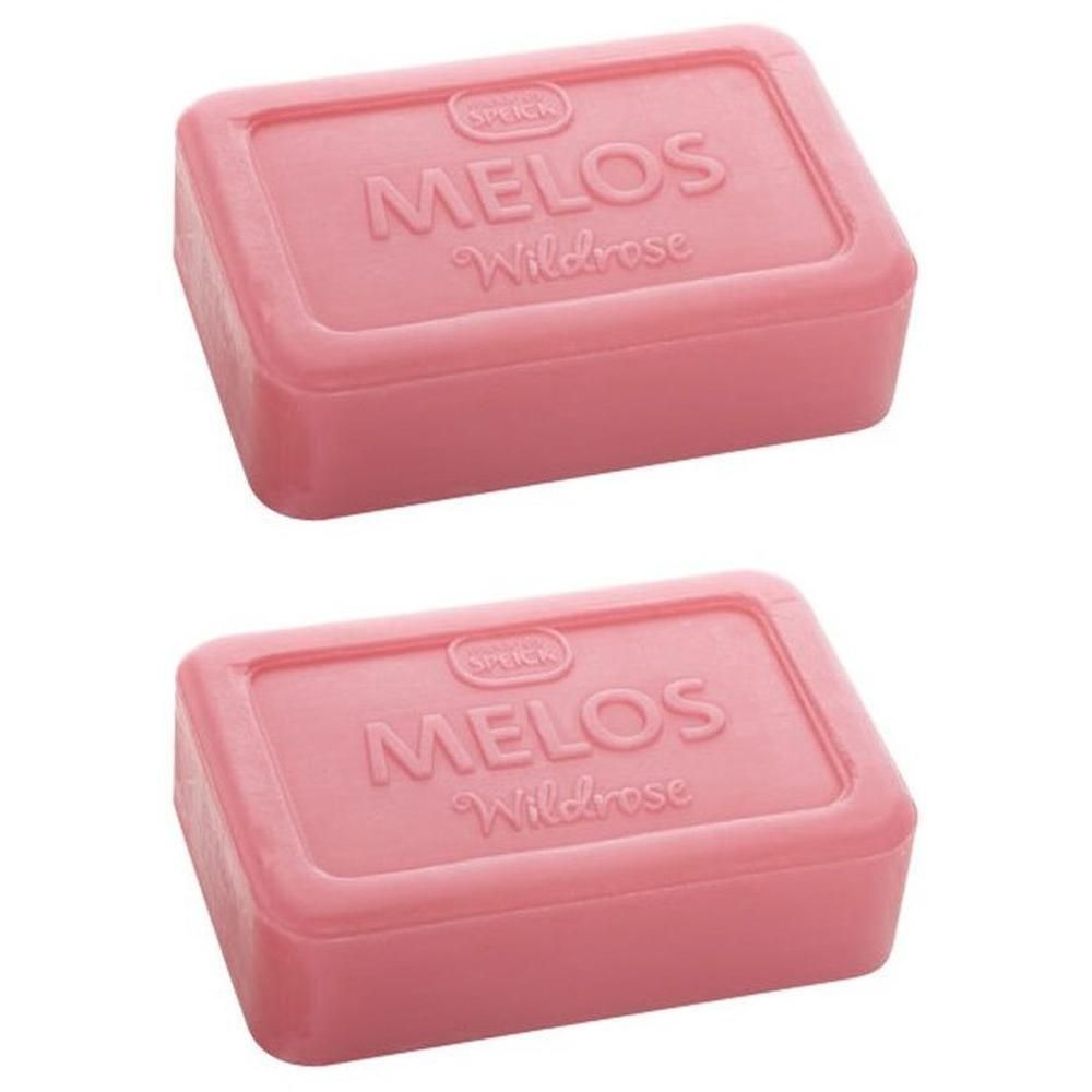 Zwei rosa Seifenstücke. Aufschrift: MELOS Wildrose.