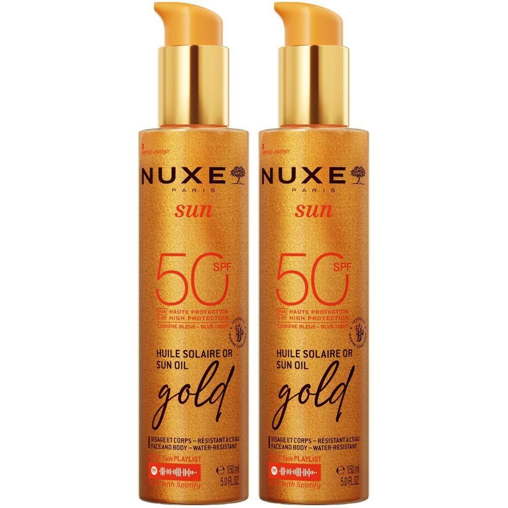 Zwei goldfarbene Sonnenöle mit SPF 50. Aufschrift: NUXE Sun, gold, huile solaire, 150 ml.