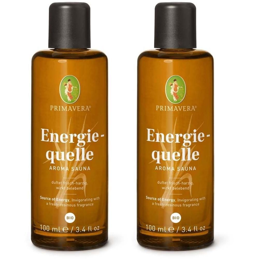 Zwei braune Flaschen mit schwarzem Deckel. Aufschrift: PRIMAVERA, Energiequelle AROMA SAUNA. Bio-Siegel. Text in Deutsch und Englisch.