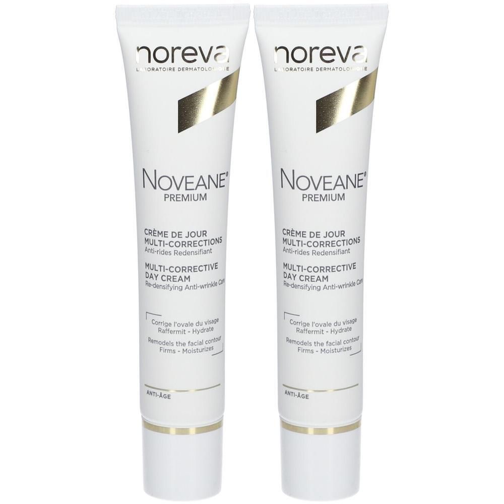 Zwei Tuben Creme. Aufschrift: Noreva Noveane Premium Crème de Jour Multi-Corrections. Weiße Tube mit goldfarbenen Akzenten.
