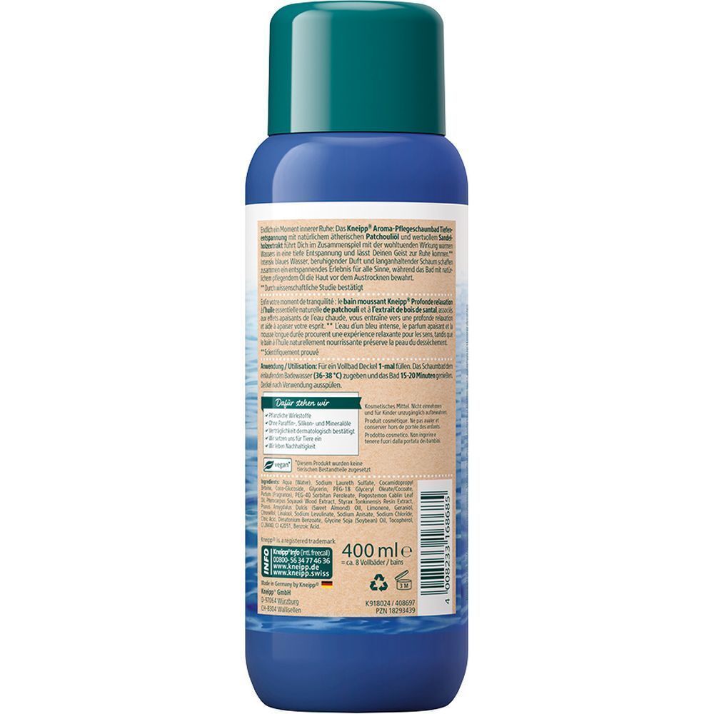 Rückseite einer blauen Flasche Kneipp Aroma-Pflegeschaumbad Tiefenentspannung. Textinformationen, Inhaltsstoffe, Anwendungshinweise.