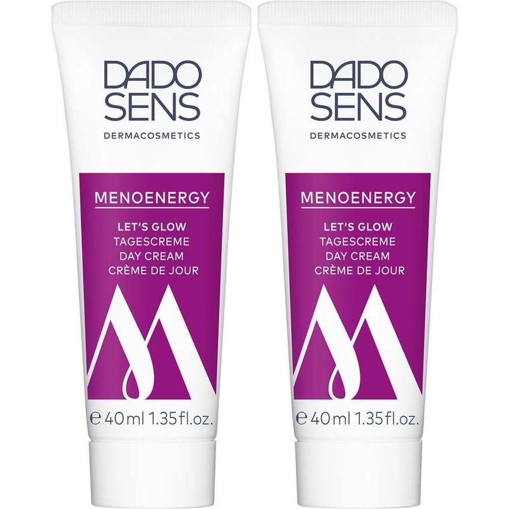 Zwei Tuben Tagescreme. Weiß, mit lila Akzenten und Schriftzug. Marke: DADO SENS. Produkt: MENOENERGY LET'S GLOW Tagescreme.