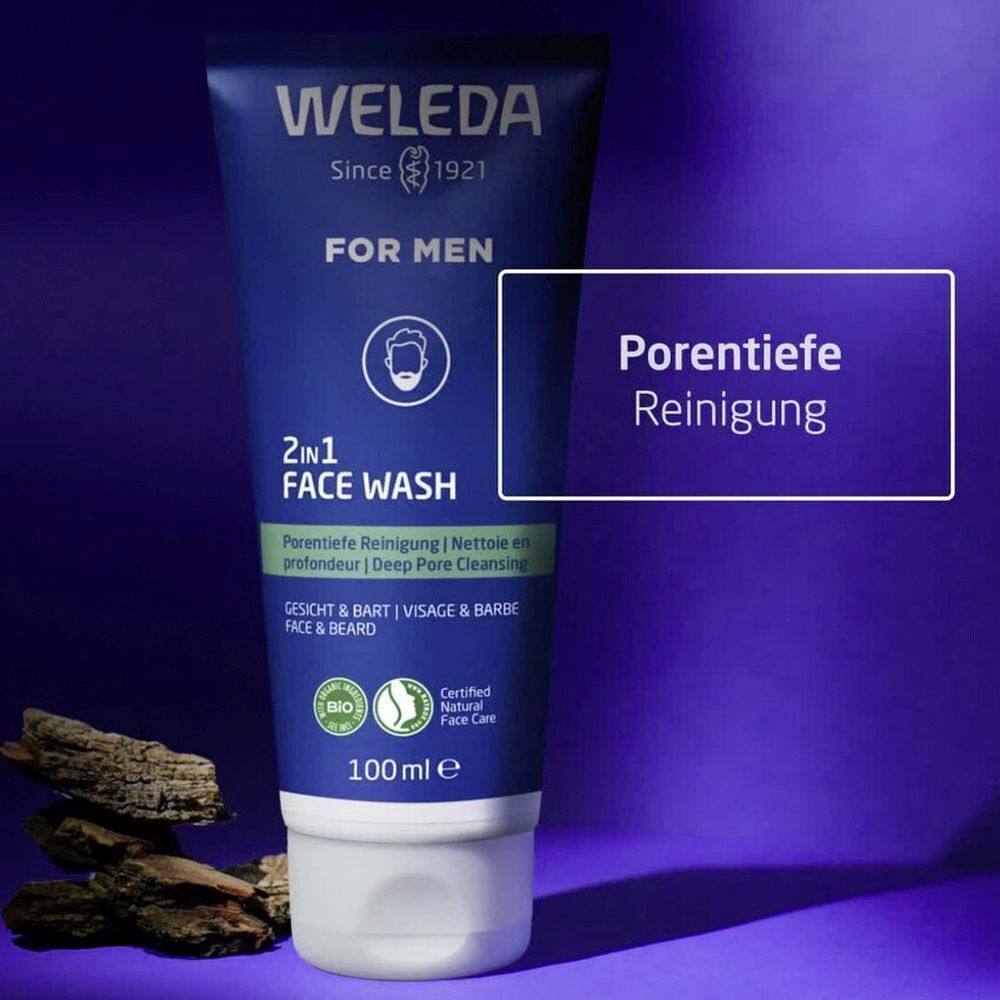 Weleda For Men 2in1 Face Wash Tube. Text: Porentiefe Reinigung. Produkt auf blauem Hintergrund.