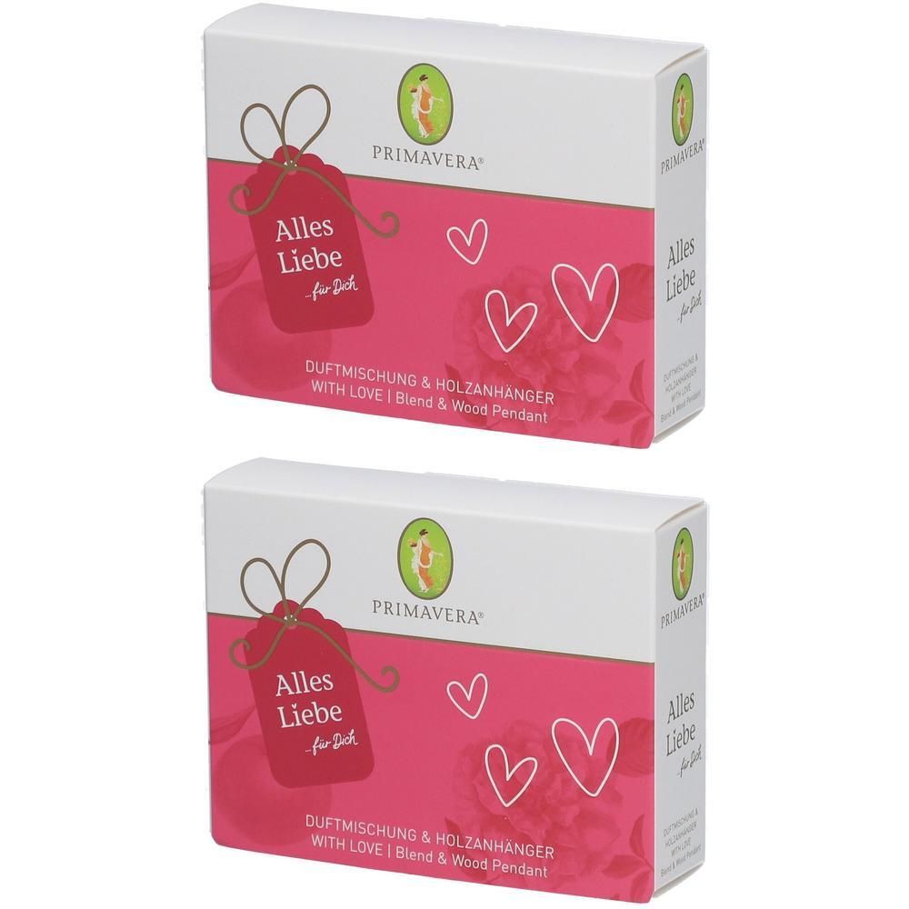 Zwei weiße Geschenkboxen mit rosa Akzenten. Aufdruck: PRIMAVERA, Alles Liebe, Herzen, Duftmischung & Holzanhänger.
