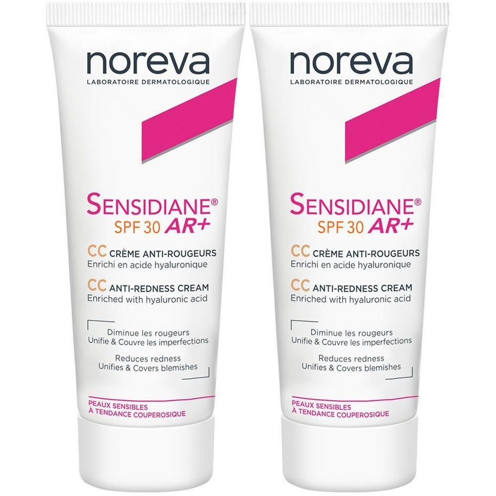 Zwei Tuben SENSIDIANE AR+ CC Crème LSF 30. Weiße Tuben mit rosa Akzenten und Produktinformationen. Marke: noreva.