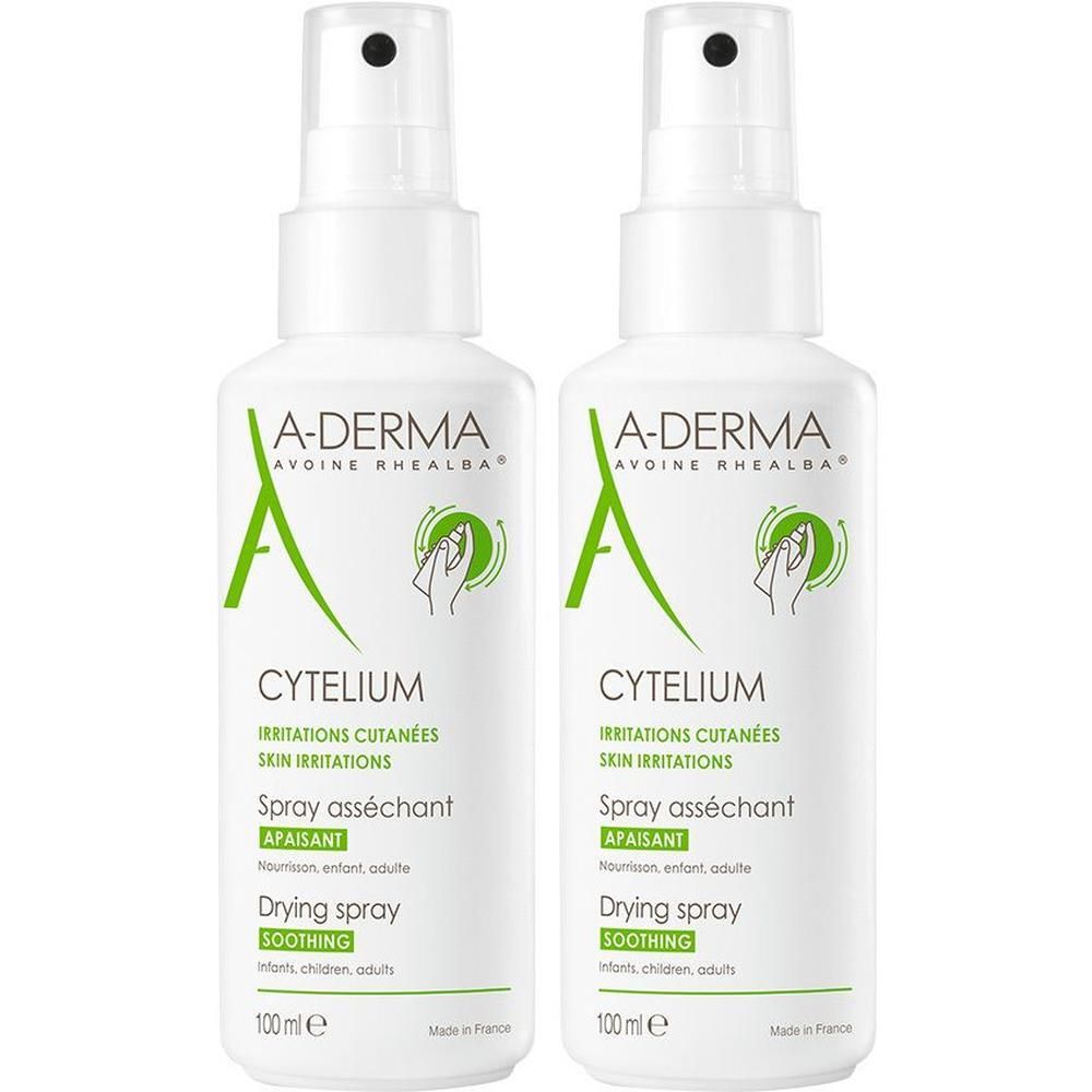 Zwei weiße Sprühflaschen mit A-DERMA CYTELIUM. Aufschrift: Irritations cutanées, Spray asséchant, Drying spray.