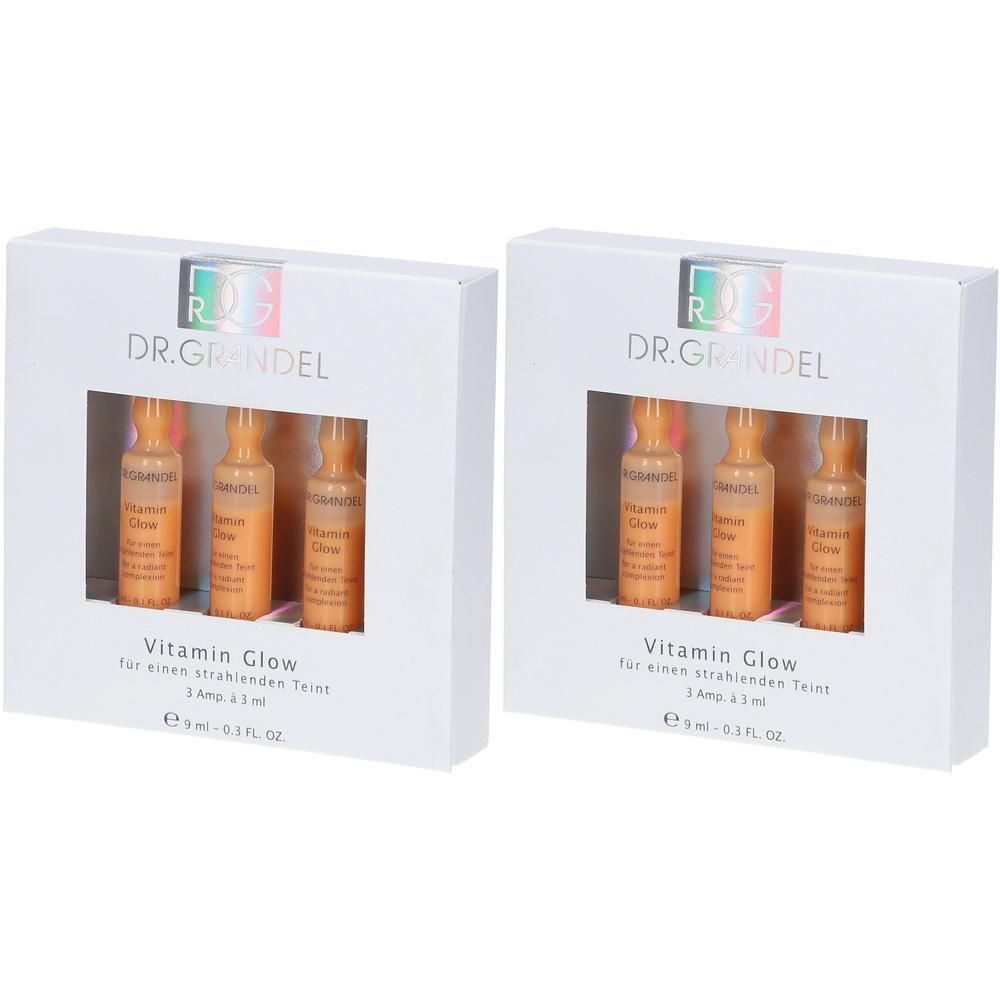 Zwei weiße Kartons mit Sichtfenster. In jedem Karton sind drei Ampullen mit orangefarbener Flüssigkeit zu sehen. Auf den Kartons steht "DR. GRANDEL Vitamin Glow".