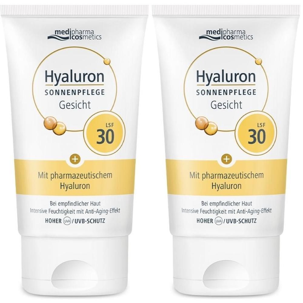 Zwei Tuben medipharma cosmetics Hyaluron Sonnenpflege Gesicht LSF 30. Weiße Tuben mit gelben Akzenten und Produktinformationen.