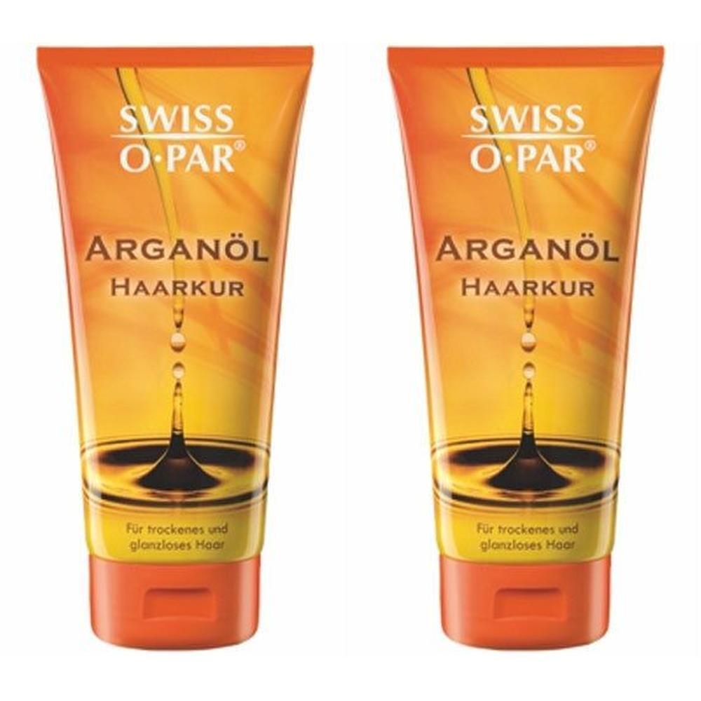 Zwei Tuben mit orangefarbenem Deckel. Aufschrift: SWISS O-PAR, ARGANÖL HAARKUR. Text: Für trockenes und glanzloses Haar. Abbildung einer Flüssigkeit.