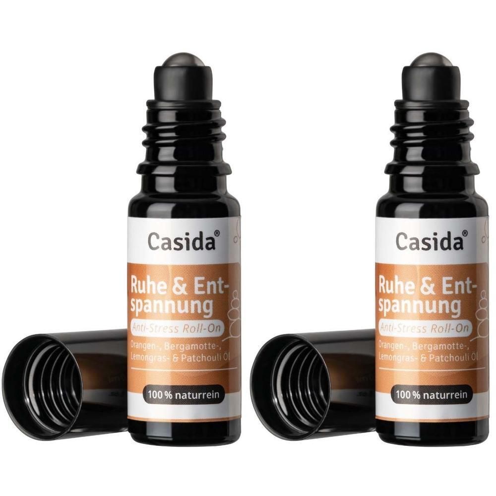 Zwei Roll-On-Flaschen. Schwarze Flaschen mit Roll-On-Aufsatz. Aufschrift: Casida, Ruhe & Entspannung, Anti-Stress Roll-On.