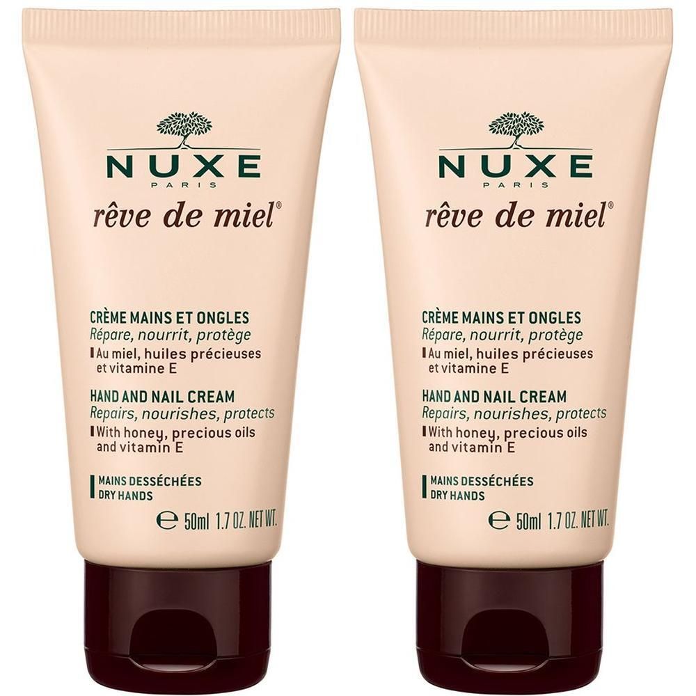 Zwei Tuben NUXE Rêve de Miel® Hand- & Nagelcreme. Beige Tuben mit braunen Verschlüssen. Text: Crème Mains et Ongles, Hand & Nail Cream.