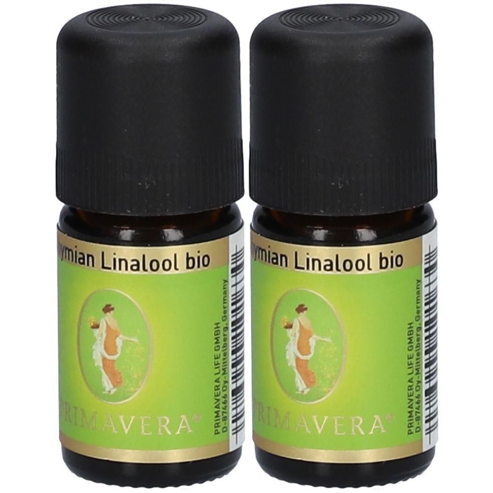 Zwei kleine Glasflaschen mit schwarzem Deckel. Auf den Etiketten steht "Thymian Linalool bio" und "PRIMAVERA".