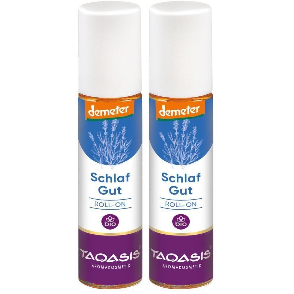 Zwei Roll-on-Flaschen mit weißem Deckel. Blaue Etiketten mit Lavendel-Illustration und Text: Schlaf Gut, Roll-on, Demeter, TAOASIS.