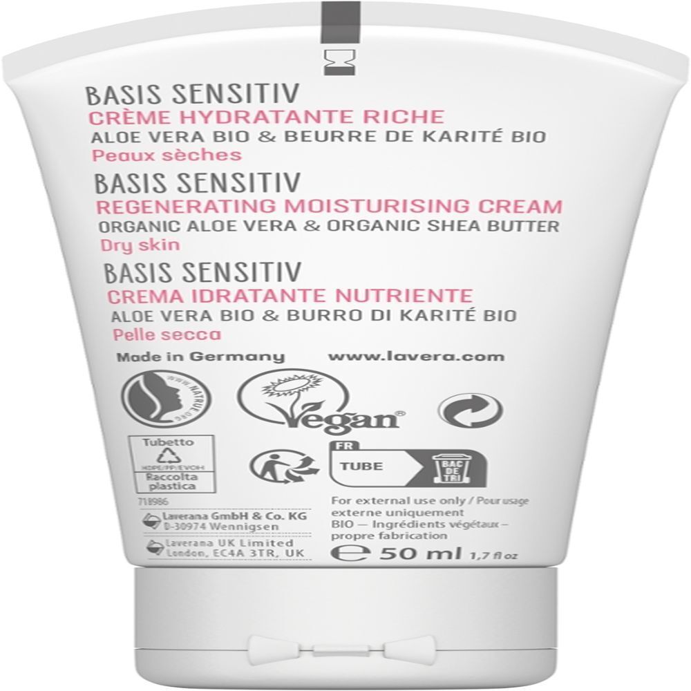 Rückseite einer Tube. Text: "BASIS SENSITIV CREME HYDRATANTE RICHE". Logos: Vegan-Siegel, weitere Siegel und Text.