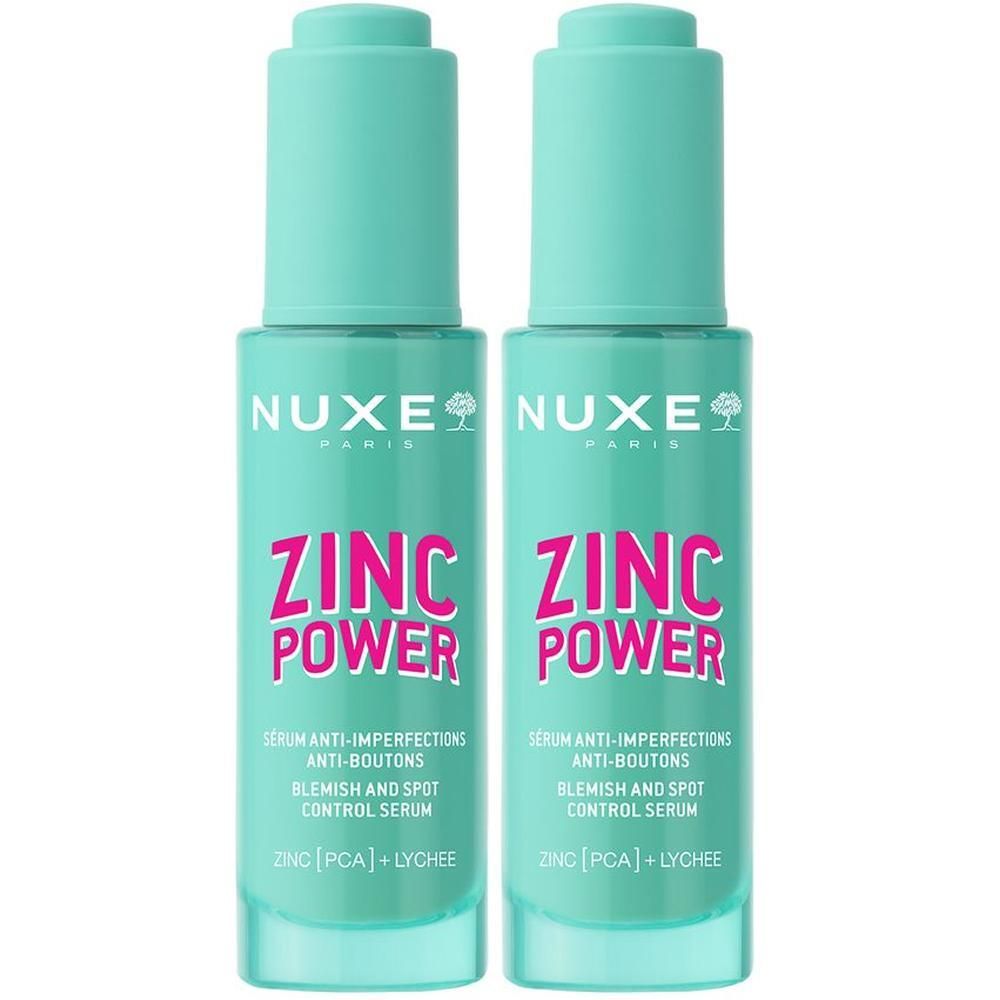 Zwei Flaschen NUXE Zinc Power Serum. Türkisgrüne Flaschen mit pinkfarbener Schrift. Aufschrift: ZINC POWER, Serum gegen Hautunreinheiten.