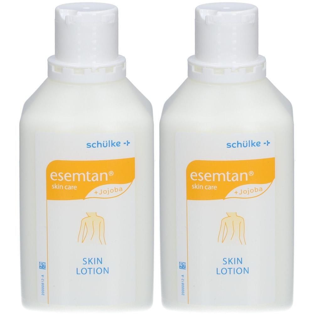 Zwei weiße Flaschen mit weißem Deckel. Auf jeder Flasche befindet sich ein orangefarbenes Etikett mit Produktinformationen und dem Logo.