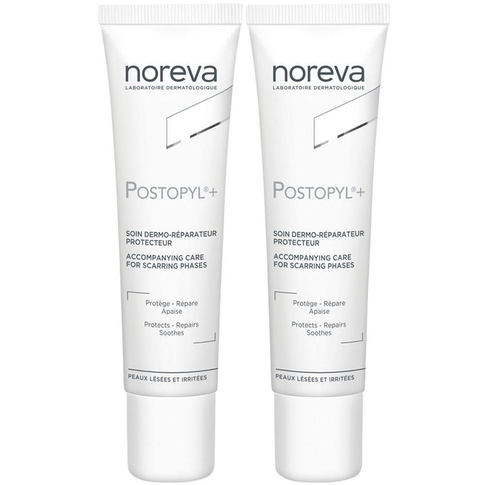 Zwei Tuben noreva Postopyl+ Emulsion. Weiße Tuben mit blauer Schrift. Produktname und Beschreibung deutlich sichtbar.