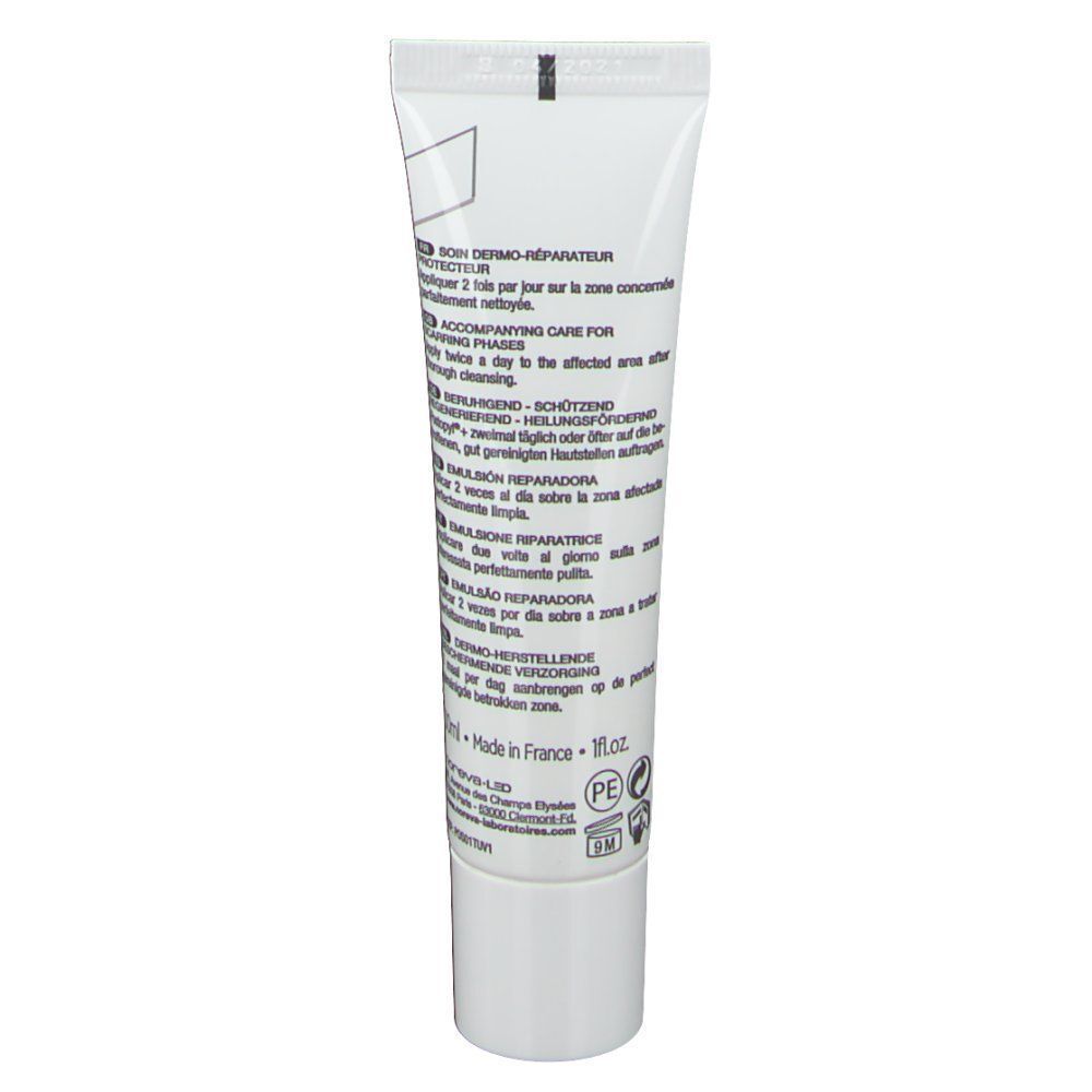 Rückseite einer Tube noreva Postopyl+ Emulsion. Weiße Tube mit Text. Gebrauchsanweisung und Herstellerinformationen.