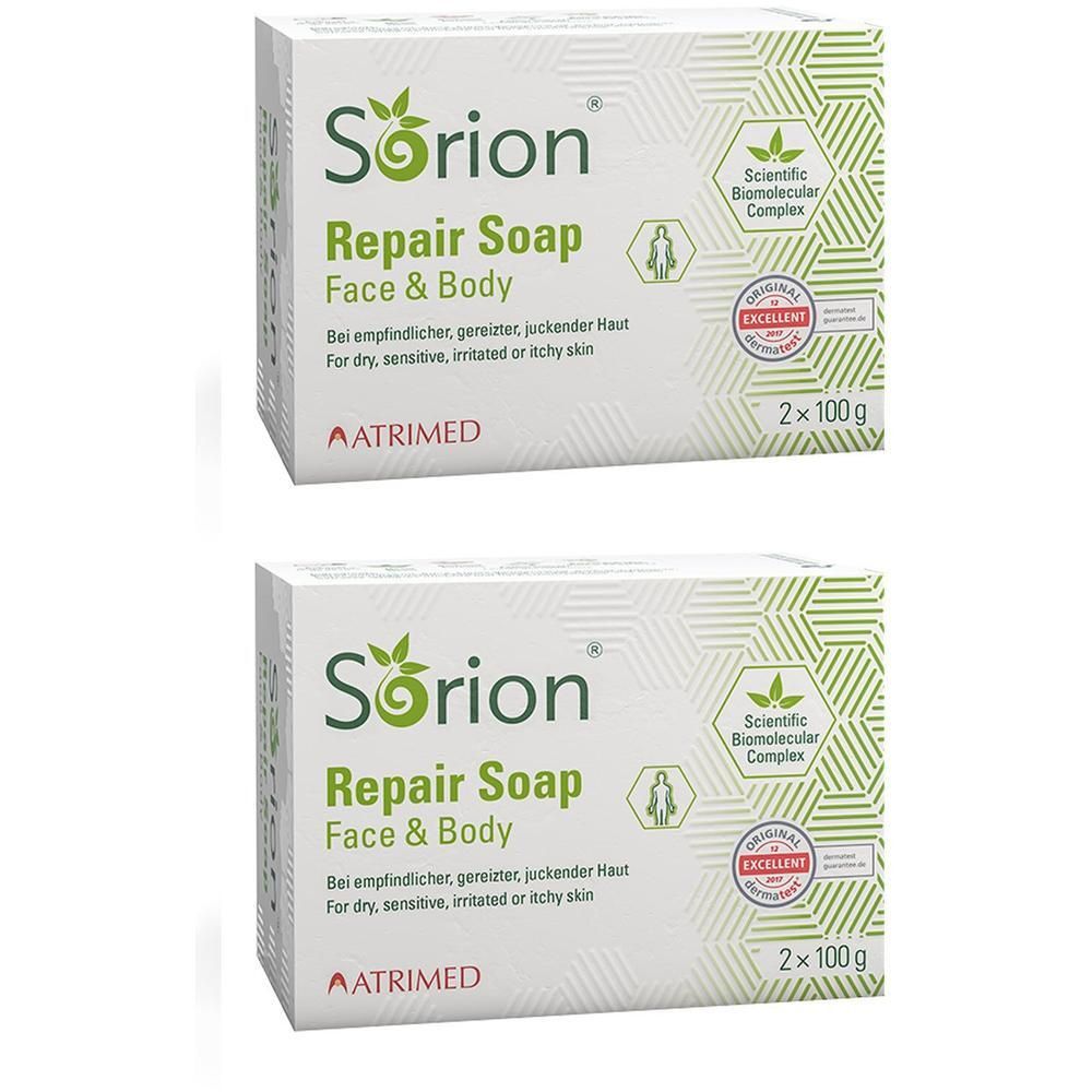 Zwei Seifenpackungen. Aufschrift: Sorion Repair Soap Face & Body. Für trockene, empfindliche, gereizte oder juckende Haut. 2 x 100 g.