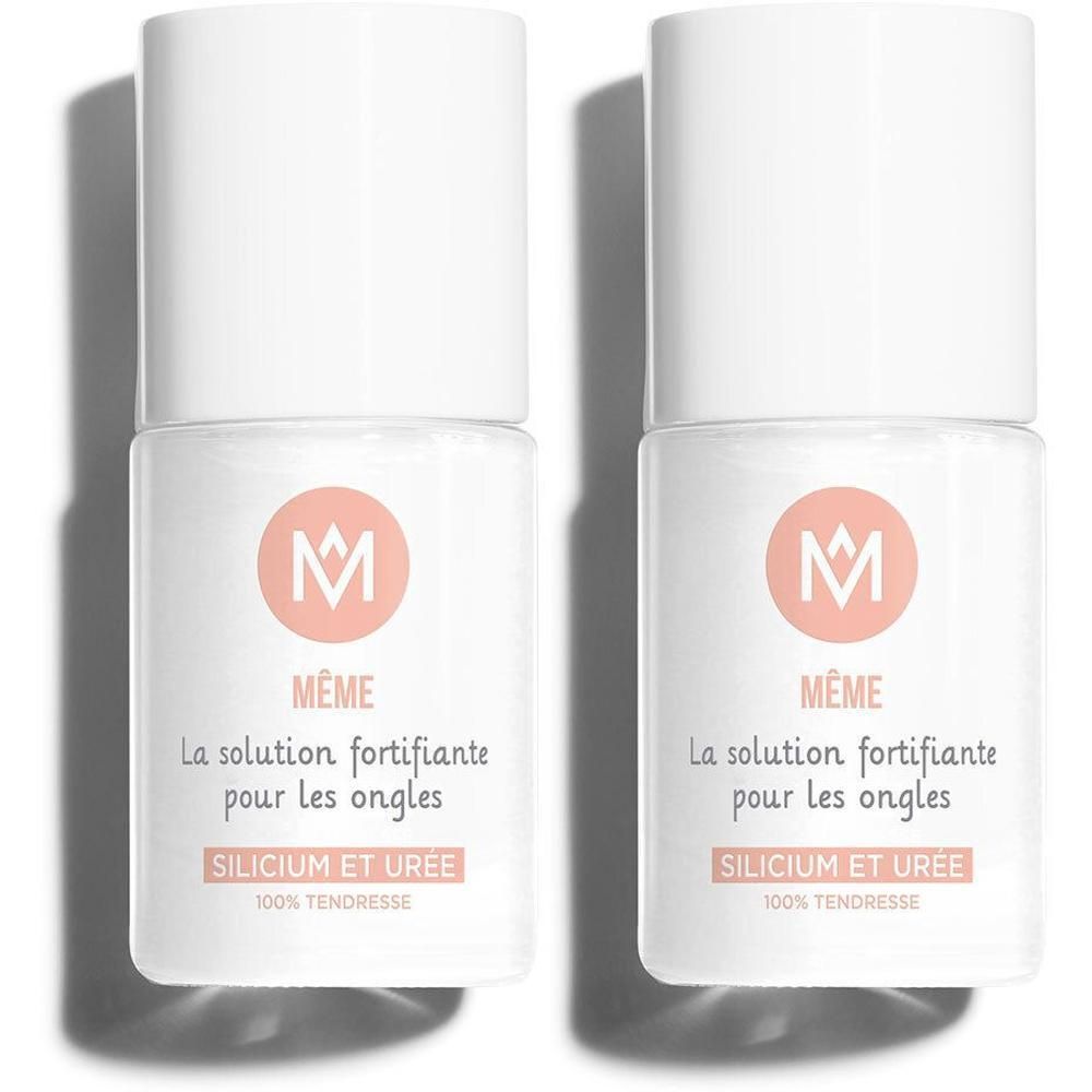 Zwei weiße Flakons mit rosa Etiketten. Aufschrift: MÊME, La solution fortifiante pour les ongles, Silicium et Urée.