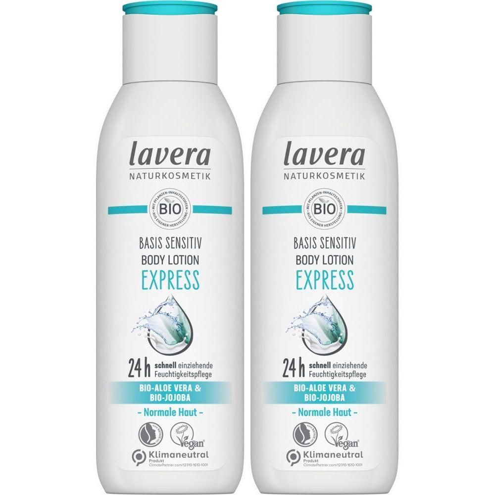 Zwei Flaschen lavera Basis Sensitiv Bodylotion Express. Weiße Flaschen mit türkisen Deckeln und Etiketten. Text: BIO, 24h Feuchtigkeitspflege.