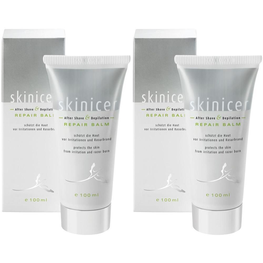 Zwei Tuben und Verpackungen. Auf den Tuben steht "skinicer Repair Balm". Verpackung: Weiß mit grauem Deckel.