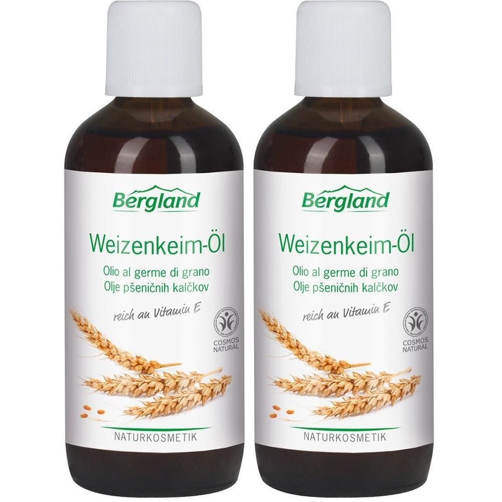 Zwei braune Flaschen mit weißem Deckel. Auf dem Etikett steht "Bergland Weizenkeim-Öl". Logos und Text in mehreren Sprachen.
