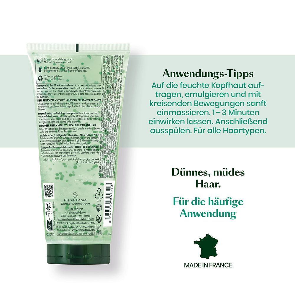 Rückseite einer Tube Shampoo. Text: Anwendungstipps, für alle Haartypen. Made in France. Grünes Logo.