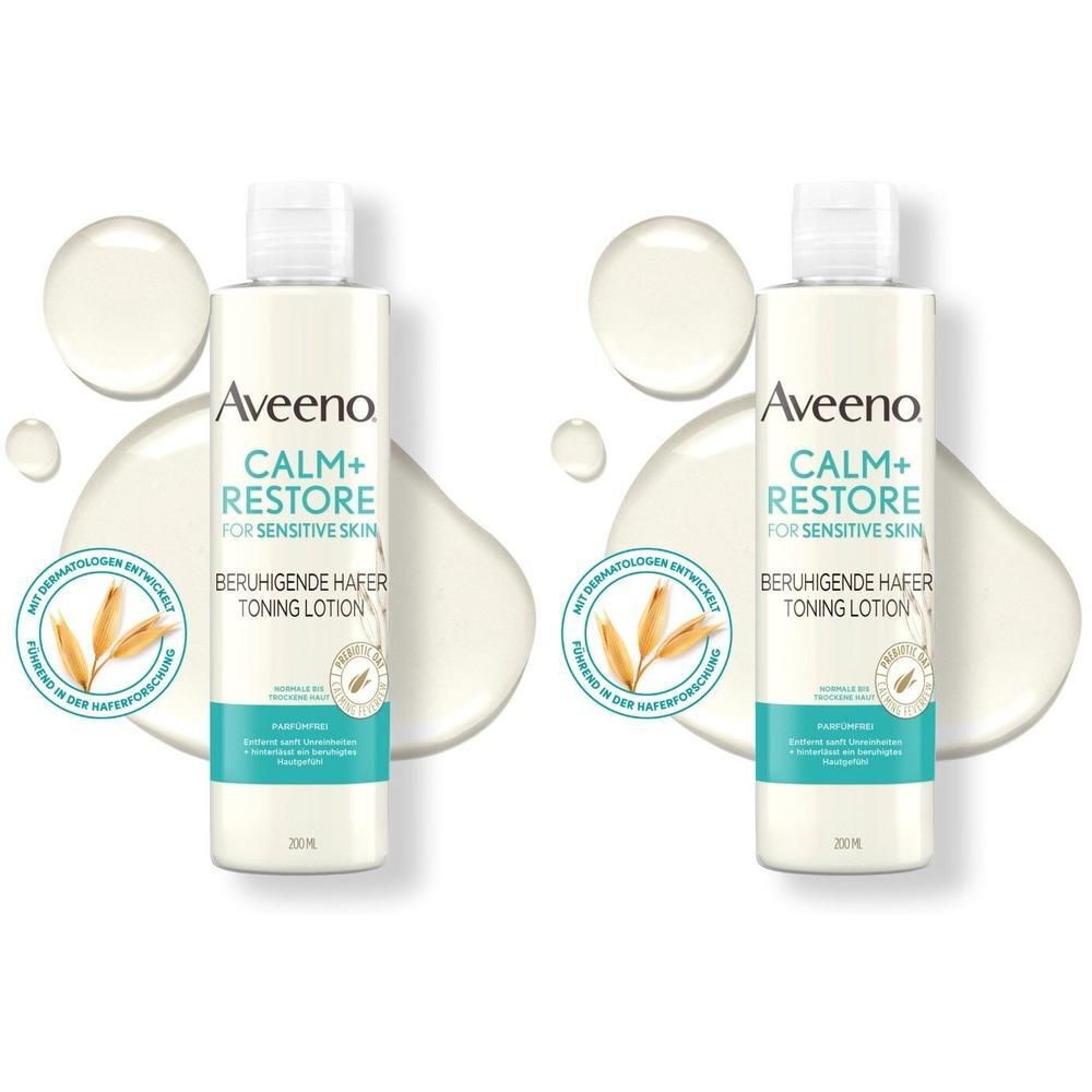 Zwei Flaschen mit weißem Deckel und Etikett. Aufschrift: AVEENO Calm+ Restore. Beruhigende Hafer Toning Lotion. Mit Hafer- und Kamillen-Illustrationen. 200 ml.