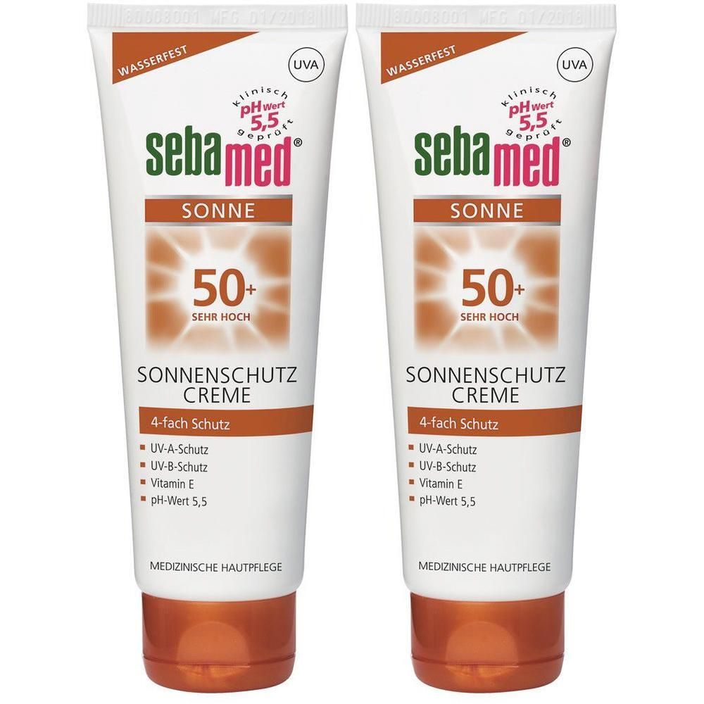 Zwei Tuben Sonnenschutzcreme. Weiß, mit braunen und grünen Akzenten. Aufschrift: Sebamed, 50+ sehr hoch, Sonnenschutz Creme.