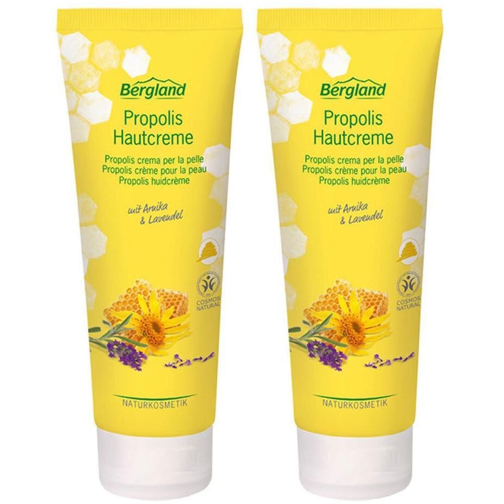 Zwei gelbe Tuben mit Aufschrift "Bergland Propolis Hautcreme". Abbildung von Honigwabe und Lavendel. Naturkosmetik.
