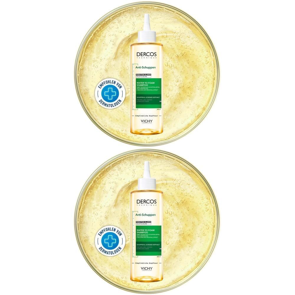 Zwei Flaschen Vichy Dercos Anti-Schuppen Shampoo in gelben Flüssigkeiten, platziert in runden Behältern.