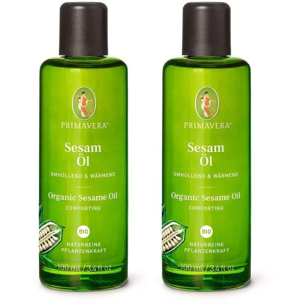 Zwei grüne Flaschen mit braunen Deckeln. Aufschrift: Primavera Sesam Öl. Bio-Zertifizierung. Text: Organic Sesame Oil, 100 ml.