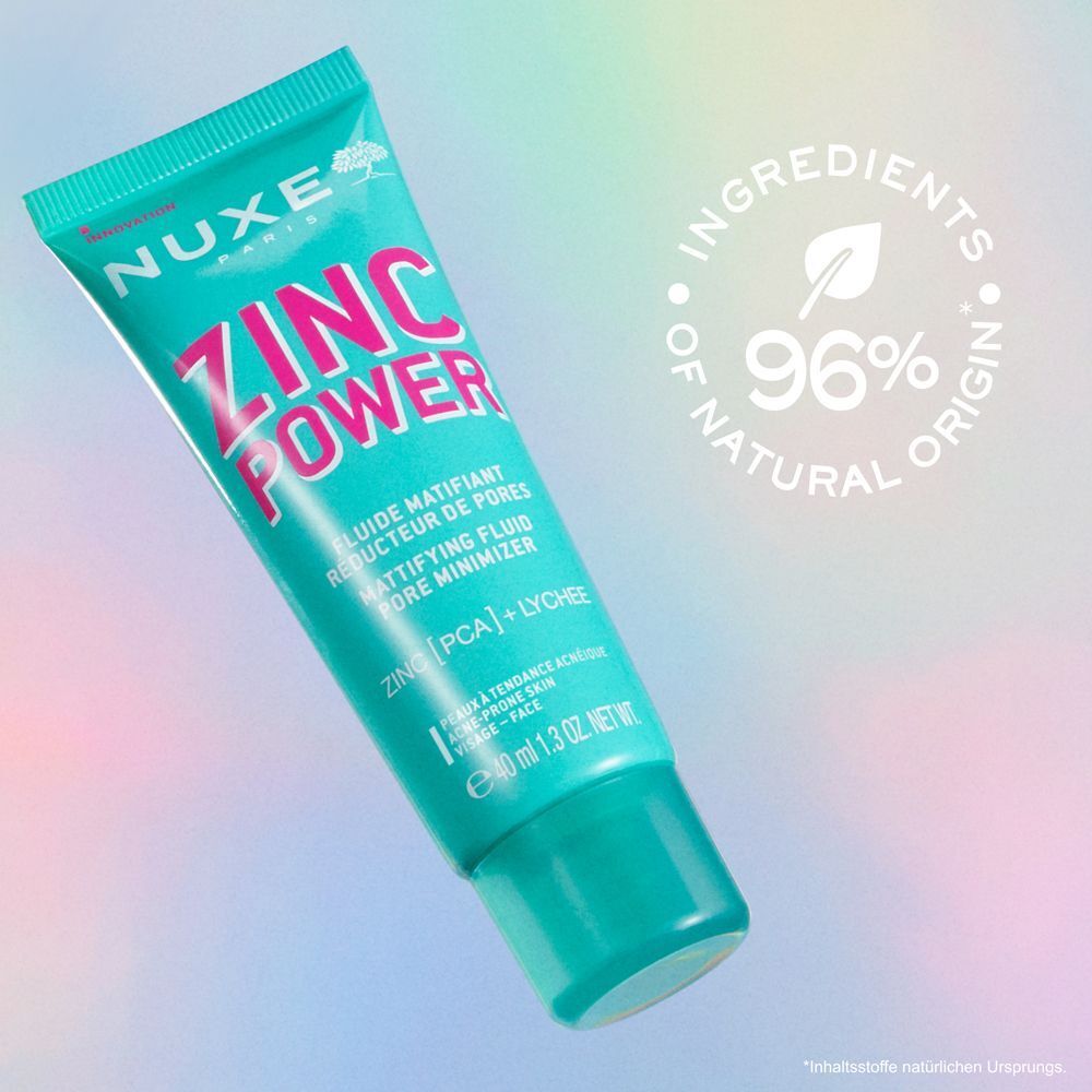 NUXE Zinc Power Fluid Tube. Türkisgrün mit pinkfarbener Schrift. Enthält Zink und Lychee. 96% Inhaltsstoffe natürlichen Ursprungs.