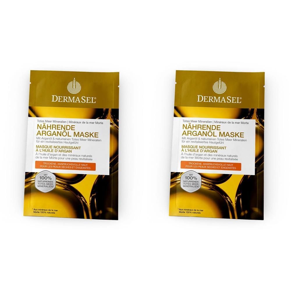 Zwei Beutel DERMASEL Maske Arganöl. Goldfarbene Verpackung mit Produktinformationen und Logo.