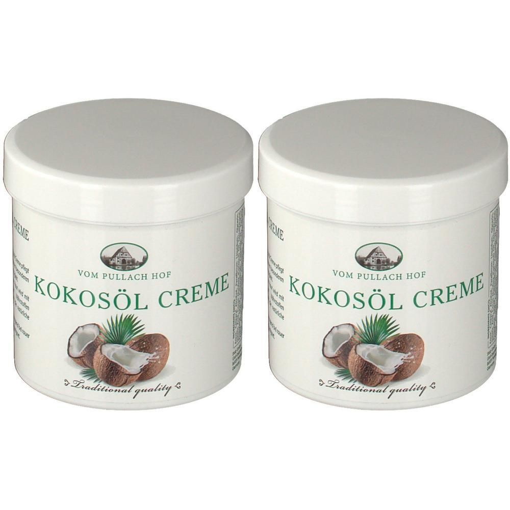 Zwei weiße Tiegel mit Deckel. Aufschrift: KOKOSÖL CREME. Abbildung von Kokosnuss und Palmenblatt. "Traditional quality".