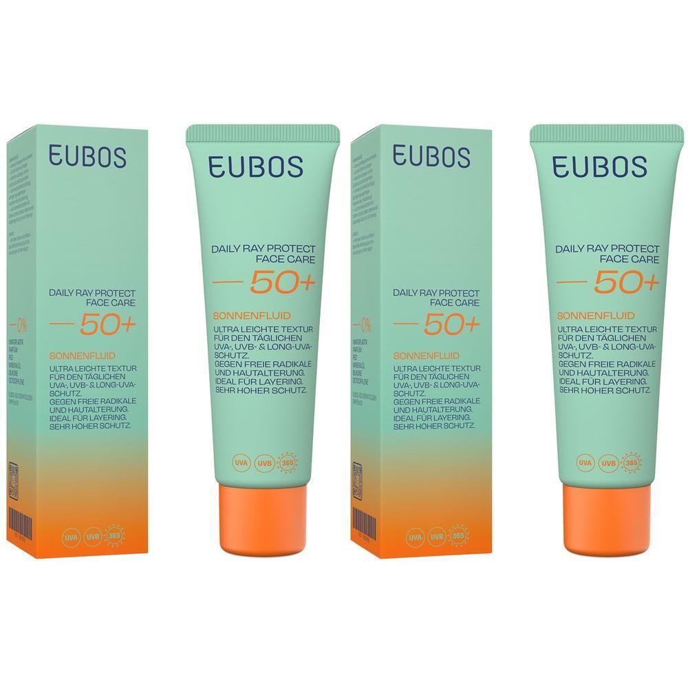 Vier Packungen und Tuben EUBOS DAILY Ray Protect Fluid LSF 50+. Grün-orange Verpackung. Text: Sonnenschutz Fluid.