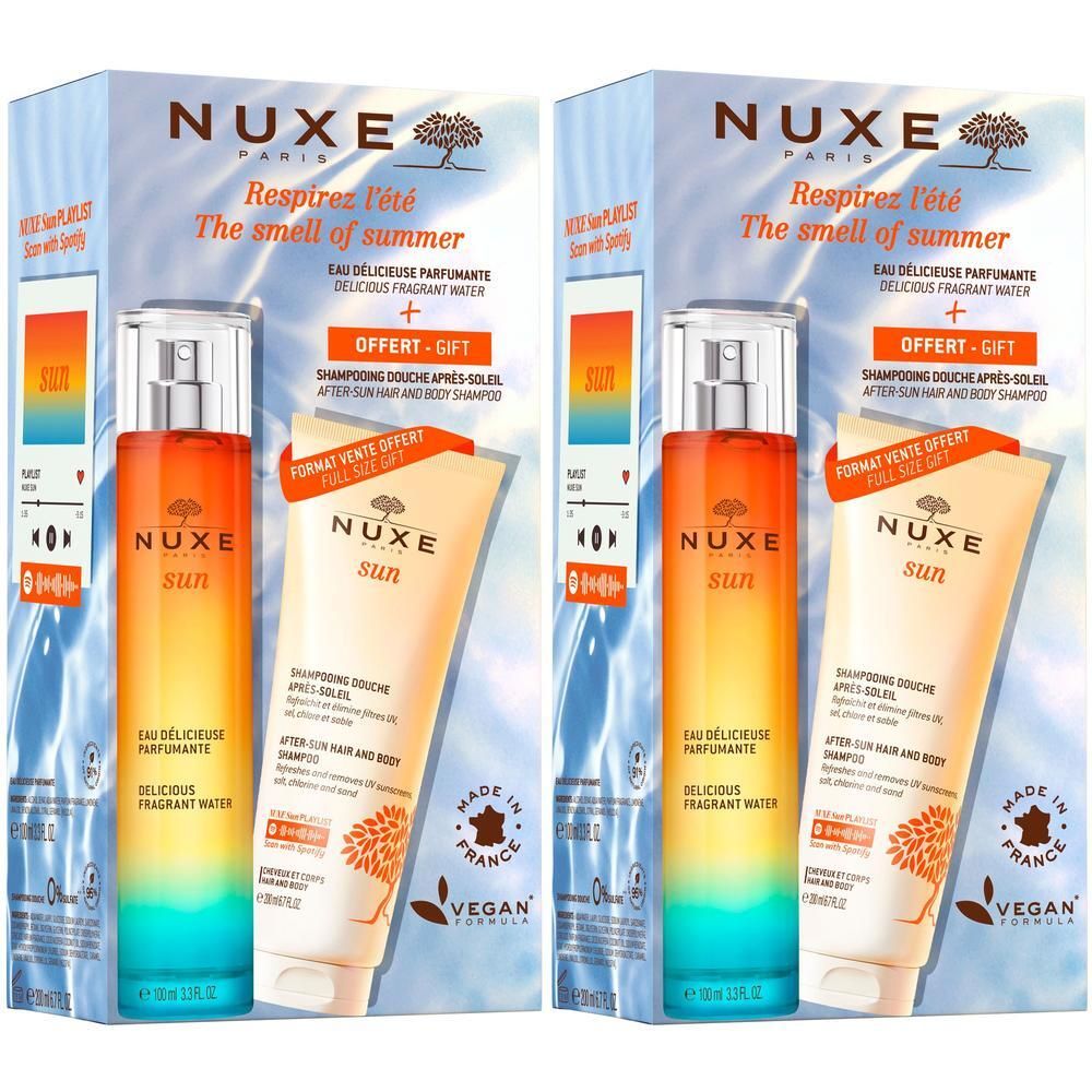 Zwei Geschenksets mit NUXE Sun Duftspray und Duschshampoo. Verpackung mit Produktnamen und Logo. Vegan-Siegel.