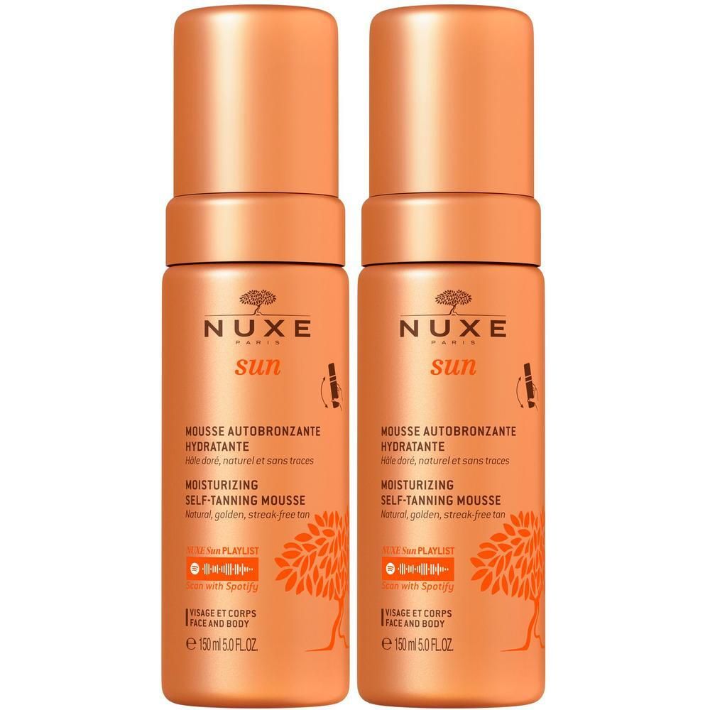 Zwei Flaschen NUXE Sun Selbstbräunungs Schaum. Orangefarbene Flaschen mit Sprühkopf. Text: MOUSSE AUTOBRONZANTE HYDRATANTE.